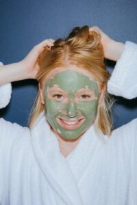Woman using HydraMask Sheet Mask – Recommended skincare mask